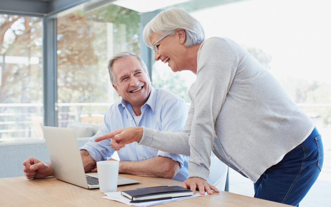 Senior couple using a digital tablet